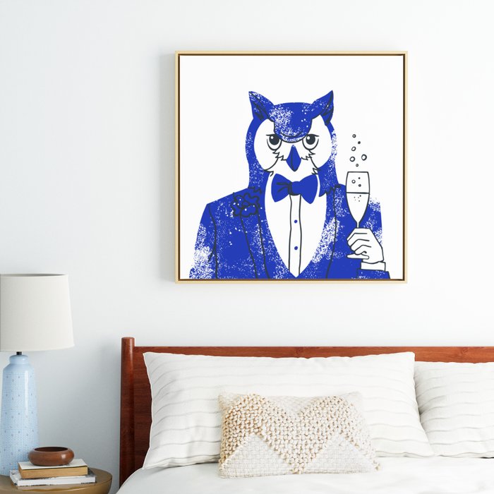 Blue dapper owl illustration framed above a neutral style bed