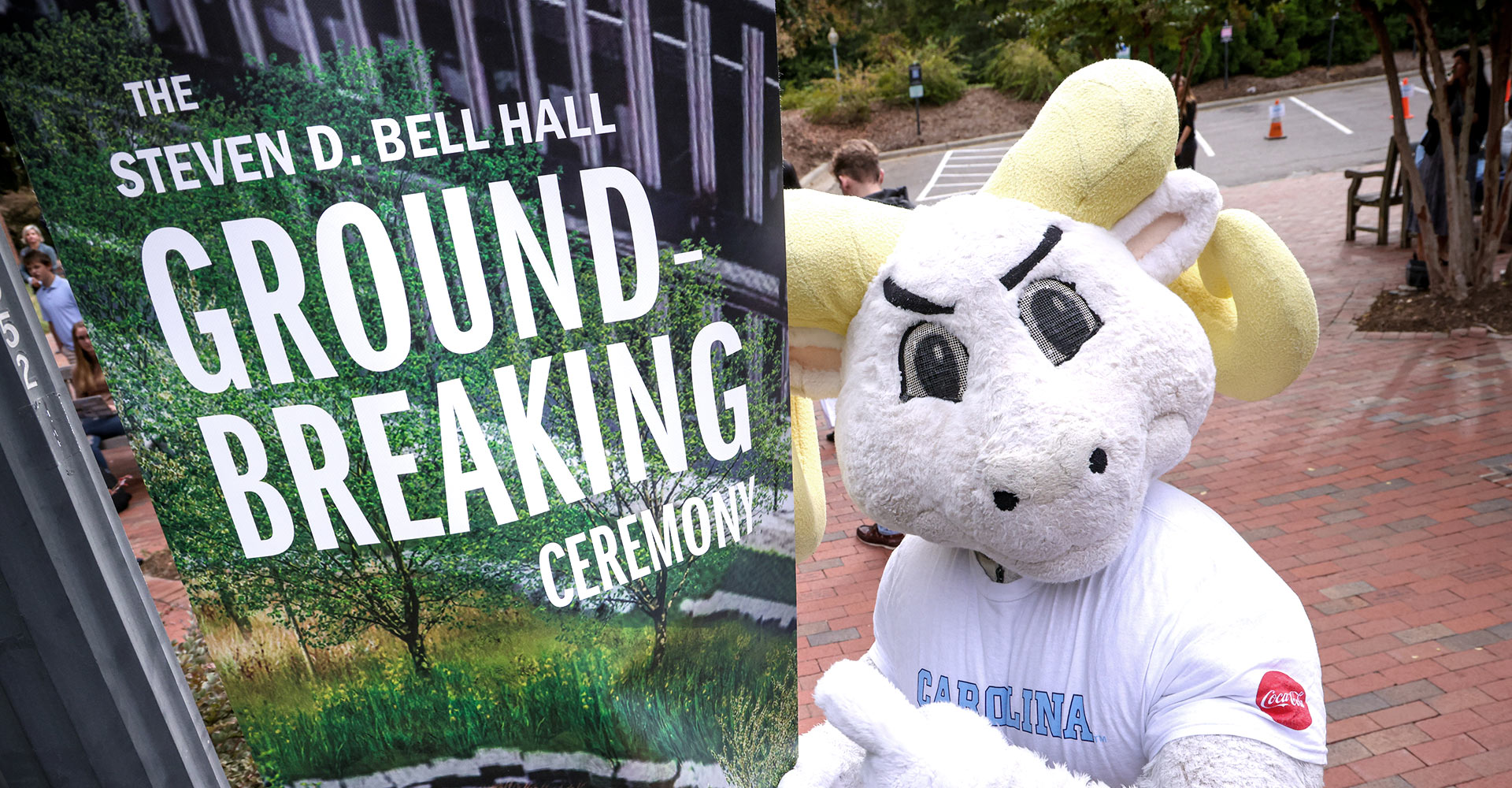 The UNC Mascot pointing to our groundbreaking sign